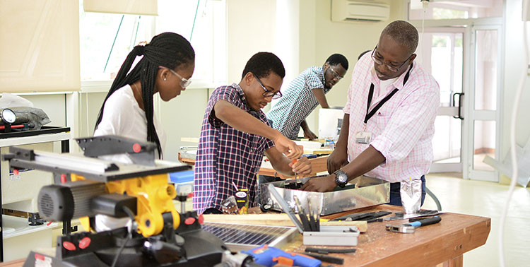 Engineering students assemble solar generators